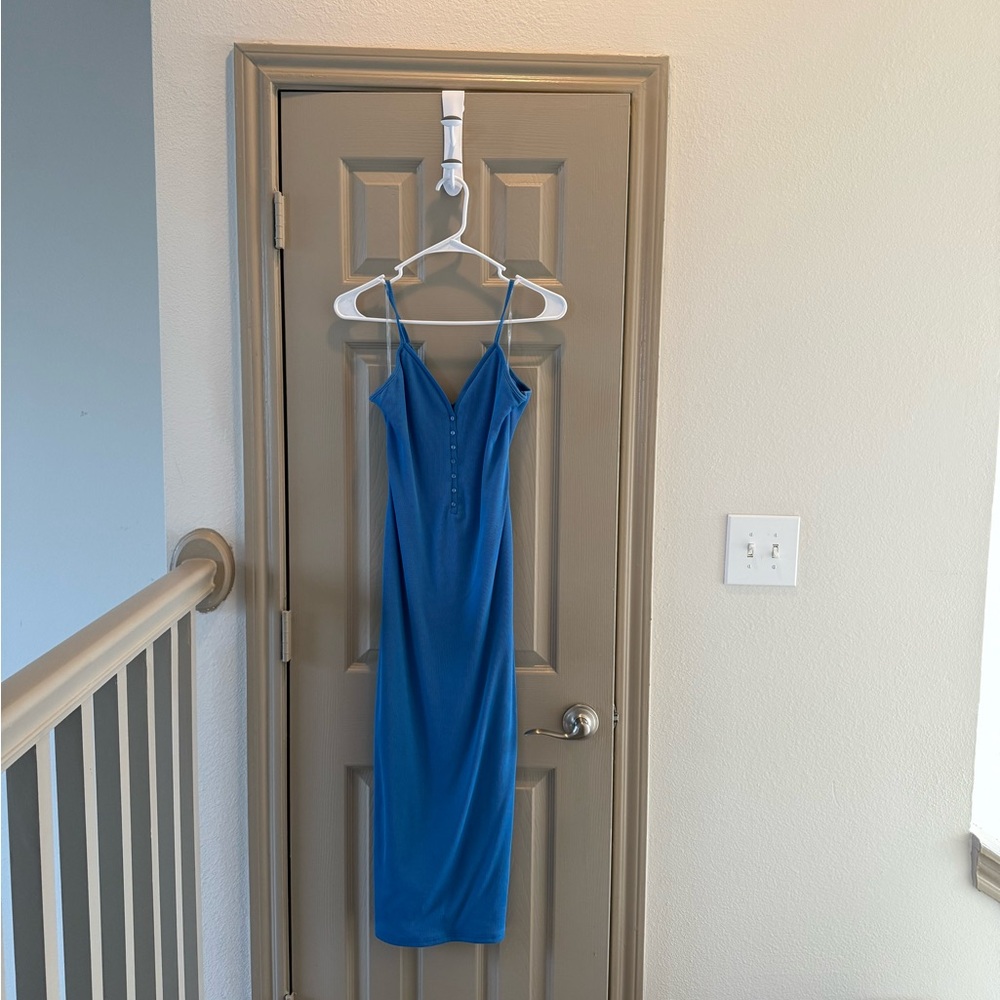 Blue knit bodycon midi dress in blue size medium